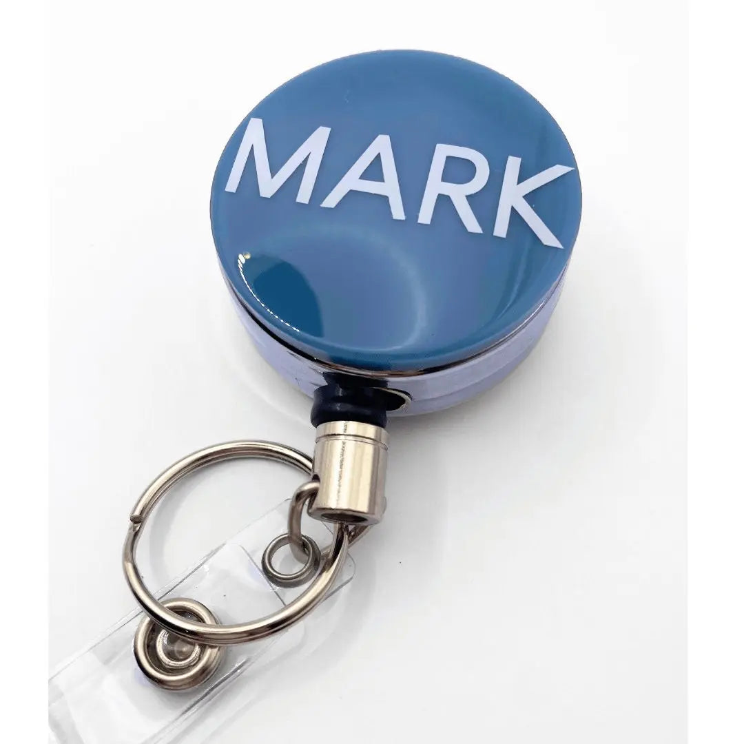 a blue badge with the word mark on it