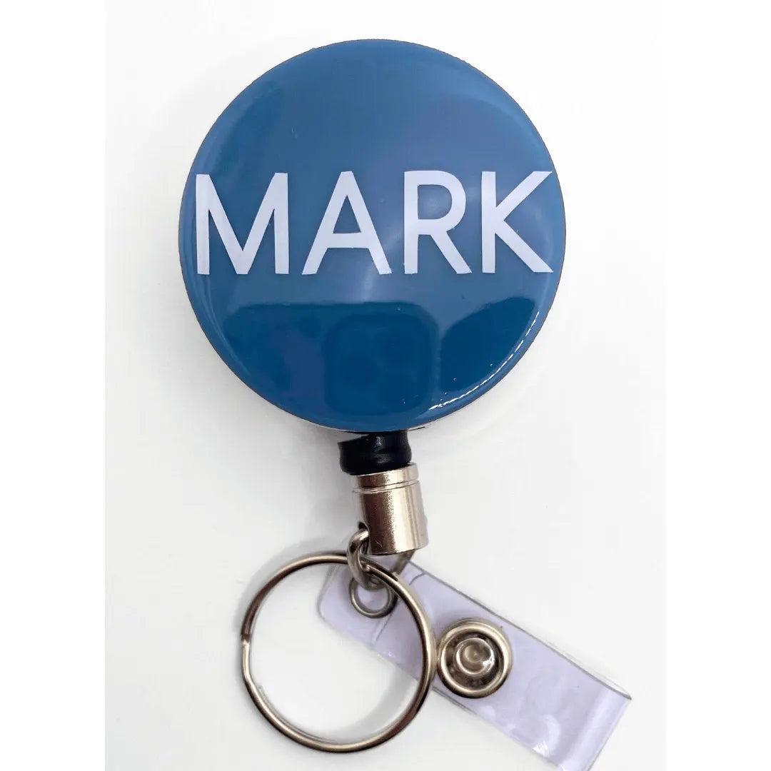 a blue badge with the word mark on it
