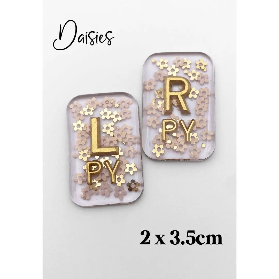 X-Ray markers - Daisies with gold letters.