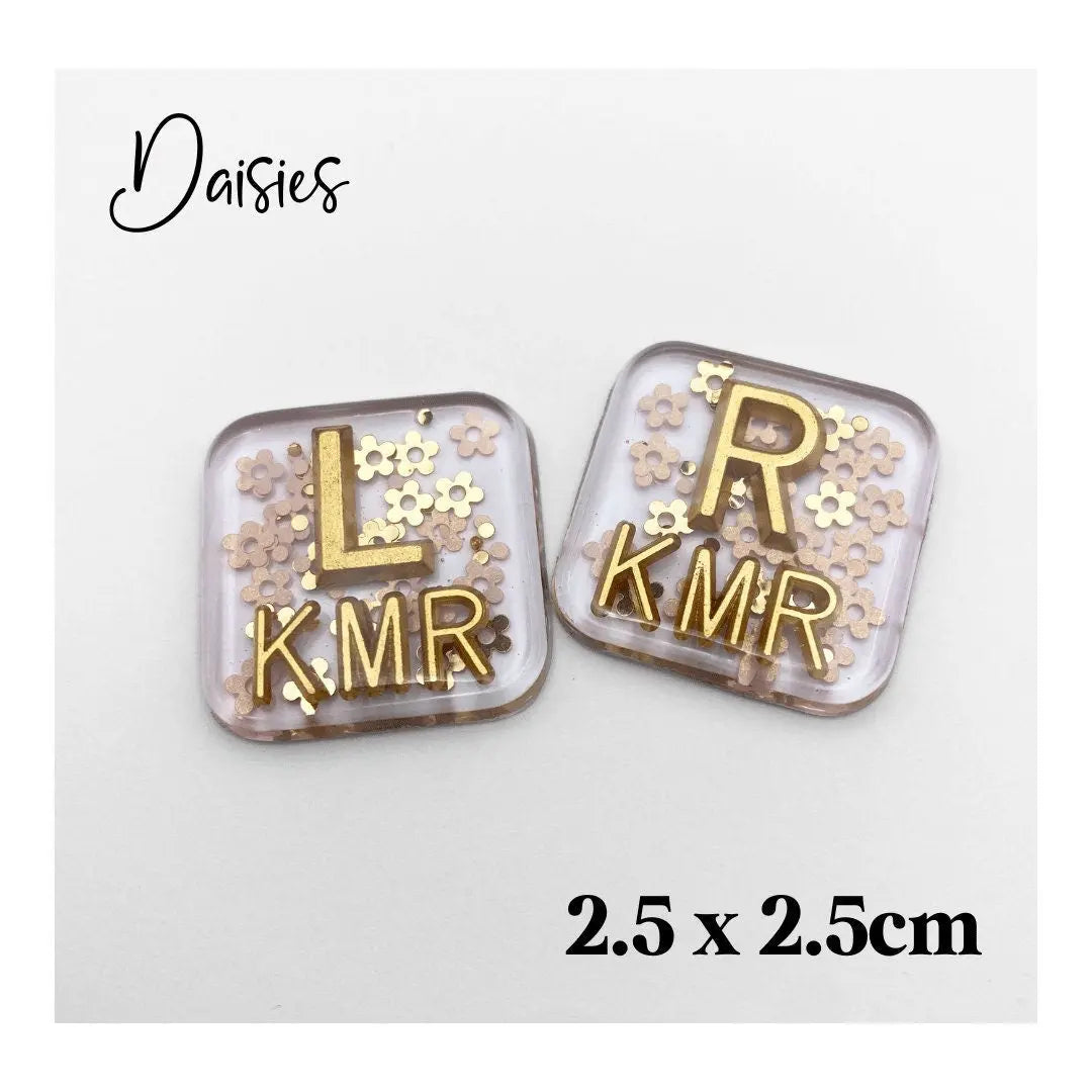 X-Ray markers - Daisies with gold letters.