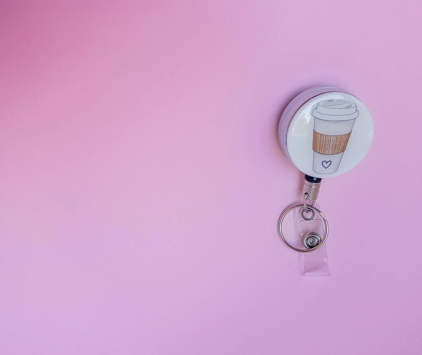 Heavy Duty Badge Reel with coffee cup.