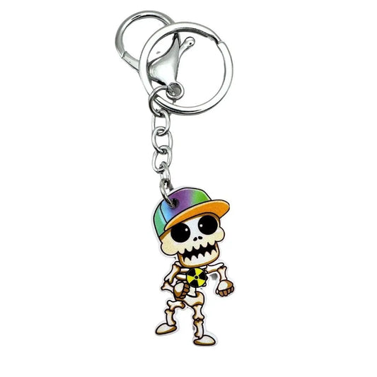 Skeleton keyring with radiation symbol on its chest and a silver keychain.