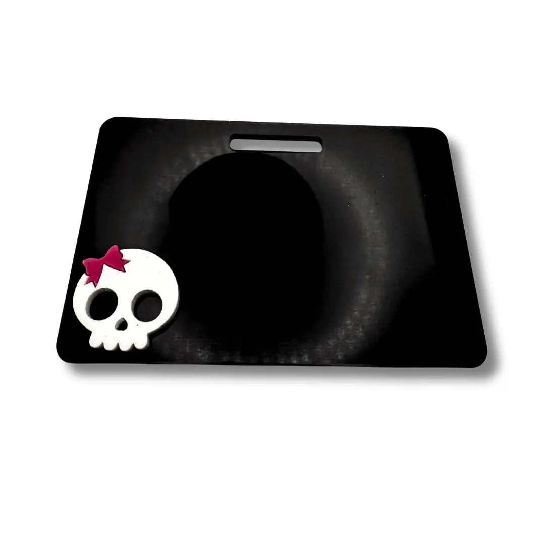 Marker Parker with white skull and pink bow.