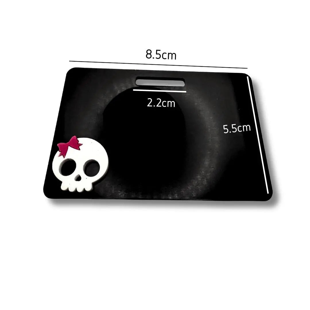 Marker Parker with white skull and pink bow.