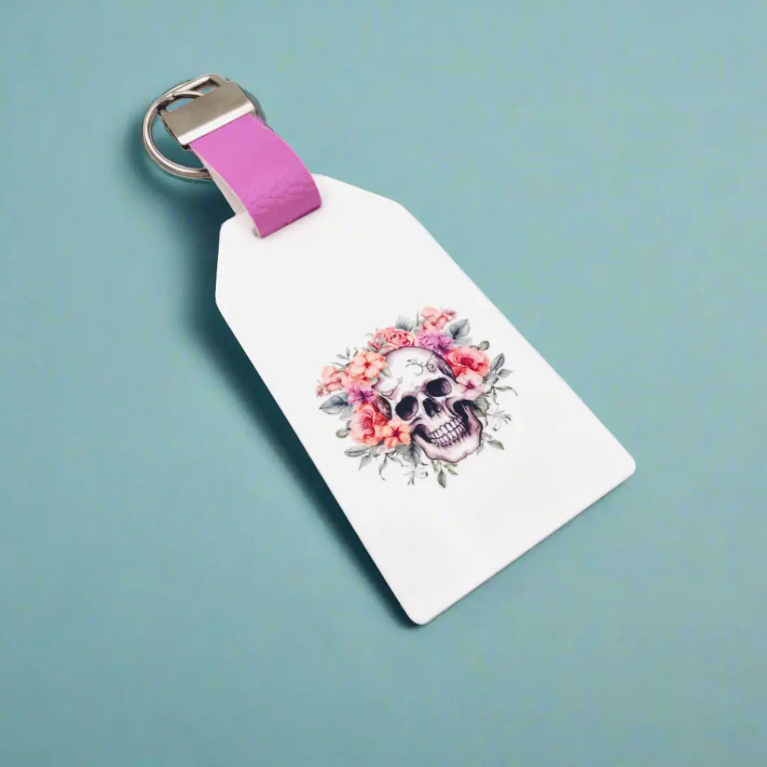 X-Ray Marker Parker with Floral Skull image on it and a pink strap to link to a badge reel. 