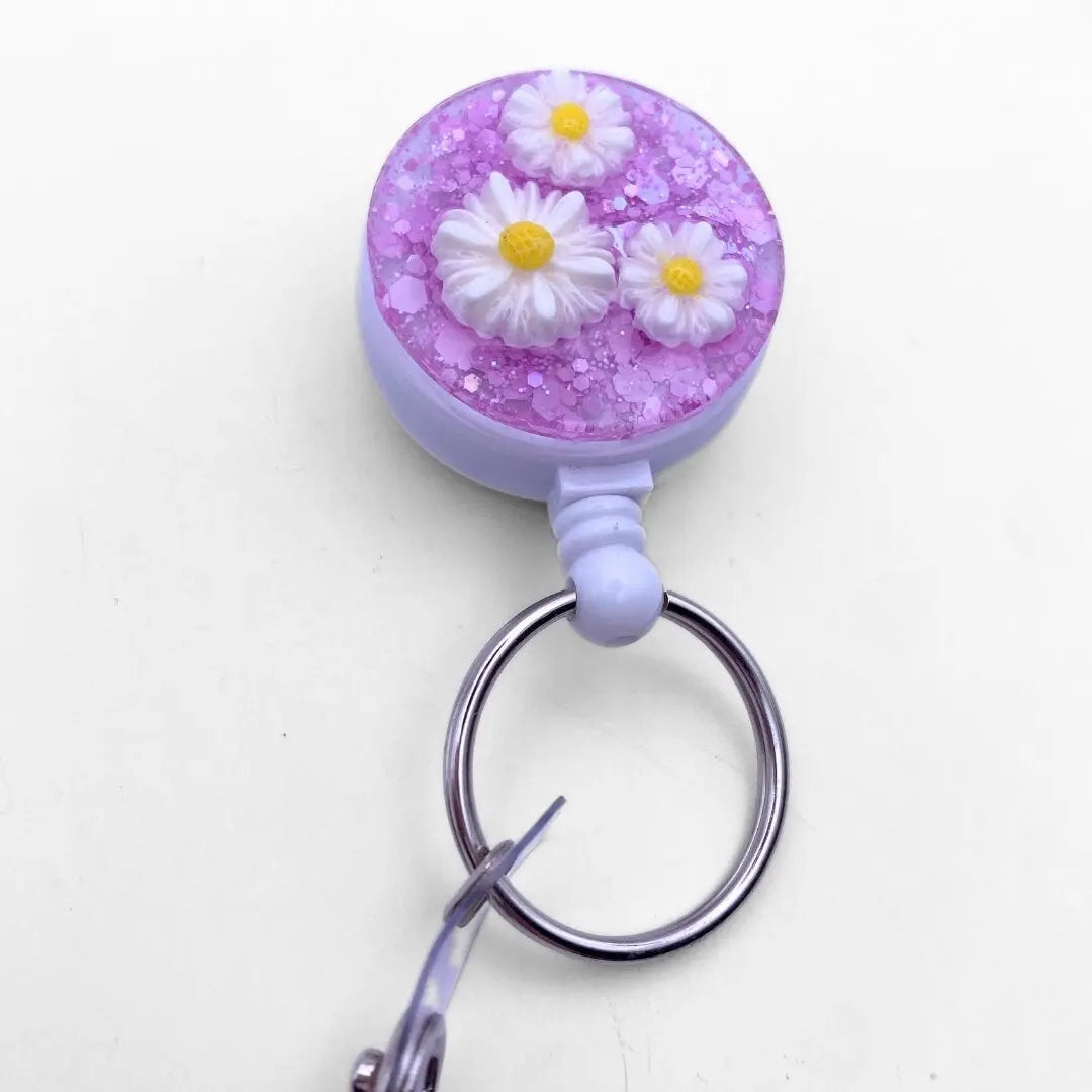 Lightweight badge reel - glitter and daisies.