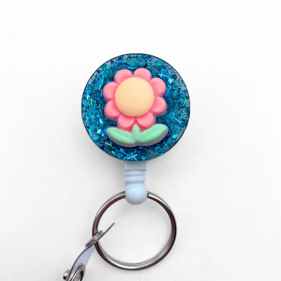 Lightweight badge reel - green glitter and flower.