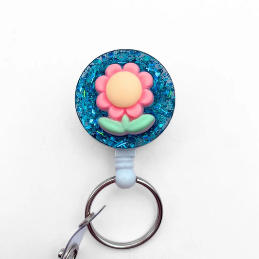 Lightweight badge reel - green glitter and flower.