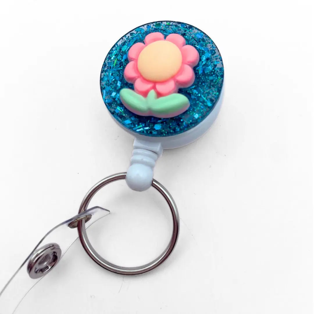 Lightweight badge reel - green glitter and flower.