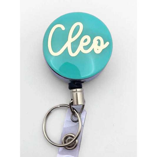 a close up of a badge on a key chain