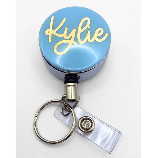 a badge holder with a name tag attached to it