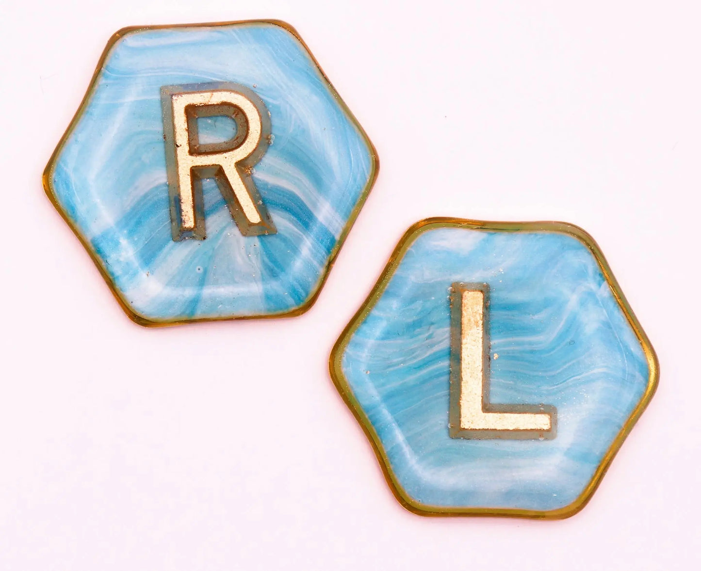 X-Ray Markers resin art with gold frames and letters. Remarkable Markers